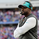 Brian Flores, who once coached the Miami Dolphins, is now an assistant coach for the Pittsburgh Steelers and the lead plaintiff in a class action lawsuit against the NFL.